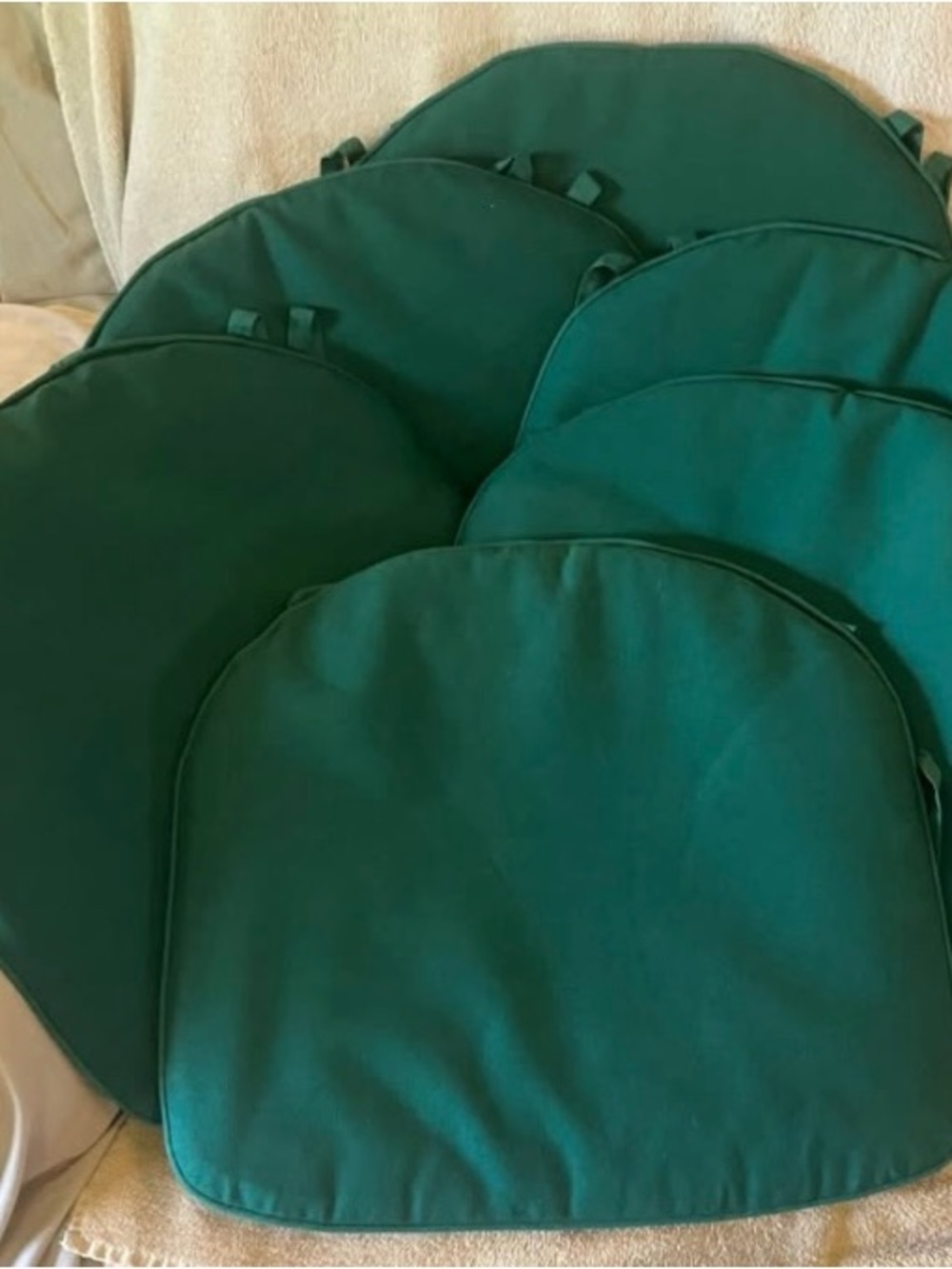 Dark green chair pads with tie strings
